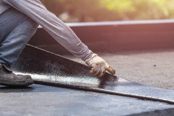 Professional Emergency Waterproofing technician working in Hohenwald, TN